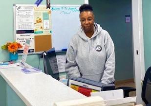 Senior Corps Member Etta working in Support Center