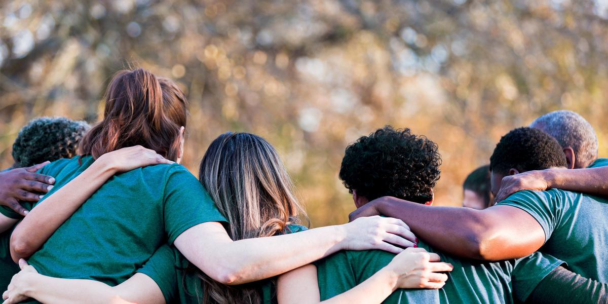 Volunteers Huddled Together