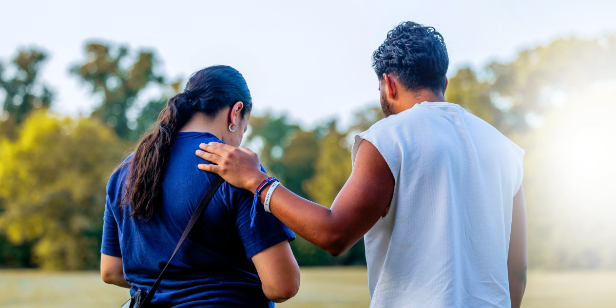 Person Comforting Another