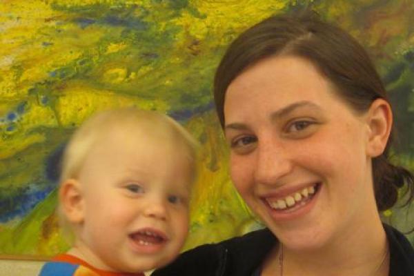 woman smiling with toddler