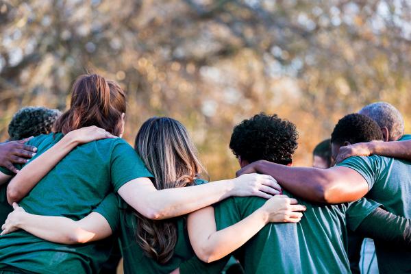 Volunteers Huddled Together